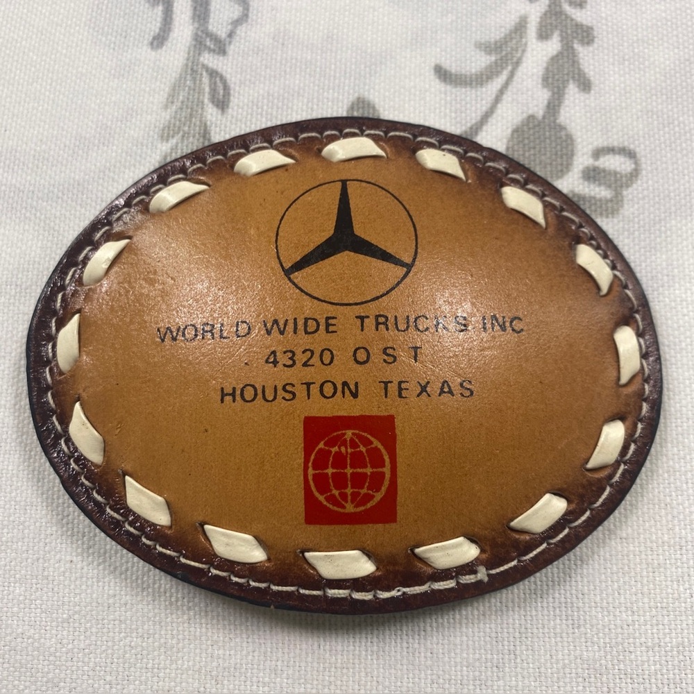 WORLD WIDE
TRUCKS, INC. OVAL LEATHER BELT‎ BUCKLE WOVEN DETAIL
